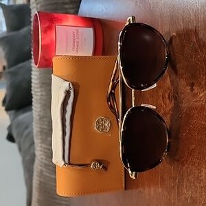 Tory Burch womens aviator gold and tortoise sunglasses with case and bag.